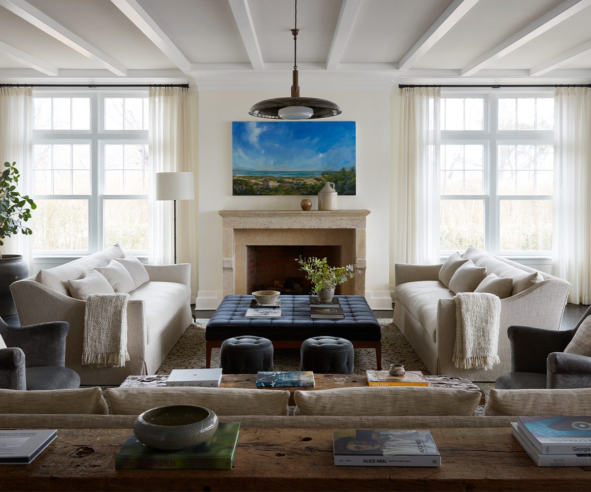 View of a Hamptons beach house living room designed by Charles & Co.