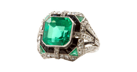 Platinum ring with a 6.11-carat Colombian emerald, diamonds and onyx, 1930s, offered by Jack Weir and Sons