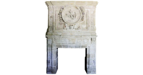 A handsome <u>carved limestone French fireplace</u>, dating from the 17th century, is offered by Origines.