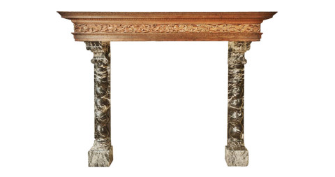 Among Willem Schermerhorn's offerings is this large <u>Baroque Dutch mantelpiece</U> with a richly carved limewood frieze of water plants and black-and-white marble jambs.