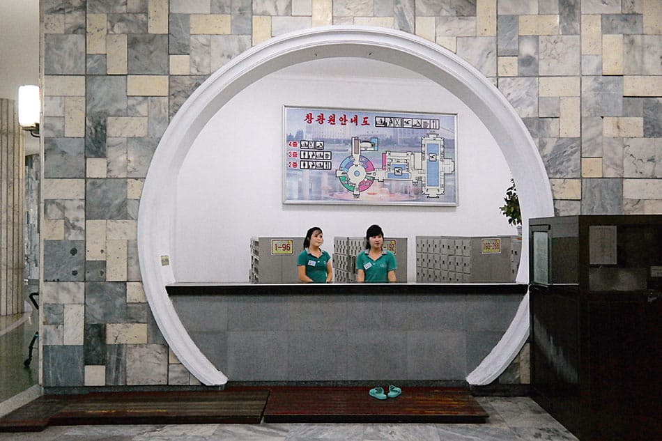 Two women at the front desk of Changgwang Health and Recreation Complex