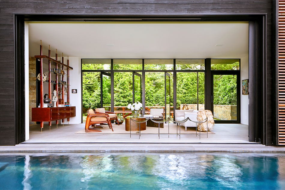 Pool sitting room designed by Blaze Makoid
