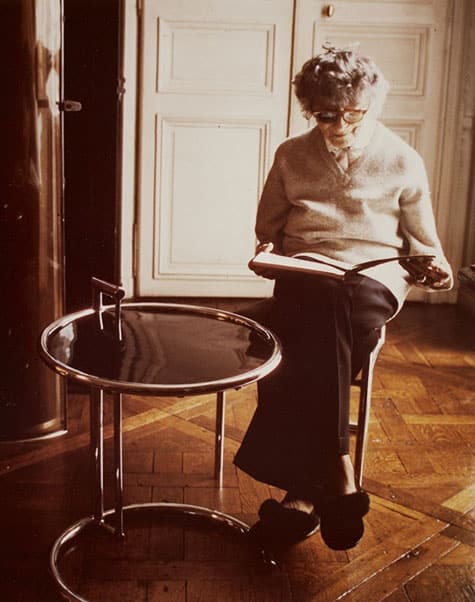 Eileen Gray in the 1970s with her E-1027 Adjustable Table