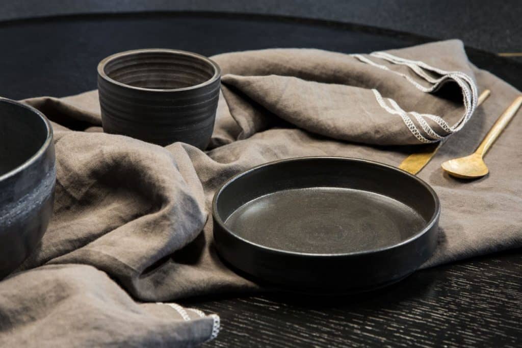 A tablecloth and bowls by Delfina Irigoin