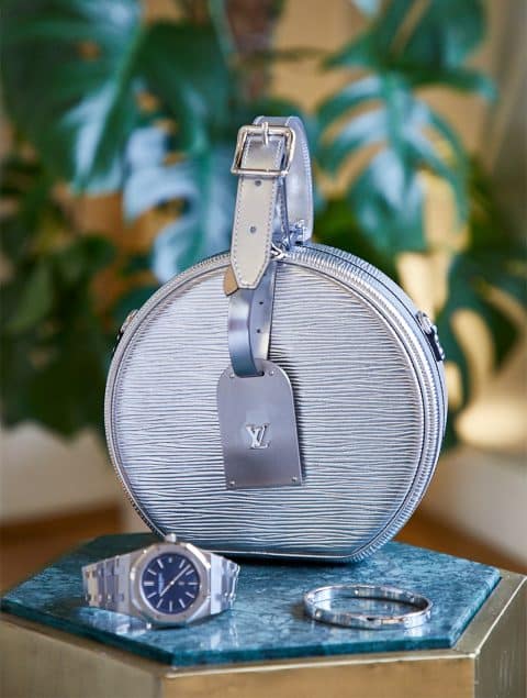 Louis Vuitton silver metallic epi leather Petite Boite Chapeau bag, a Cartier white gold and diamond Love bracelet and a Audemars Piguet Royal Oak stainless steel watch