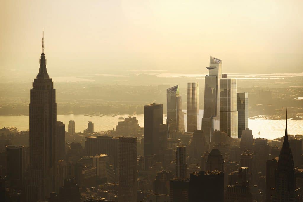 The skyscrapers of Hudson Yards rising in the distance.