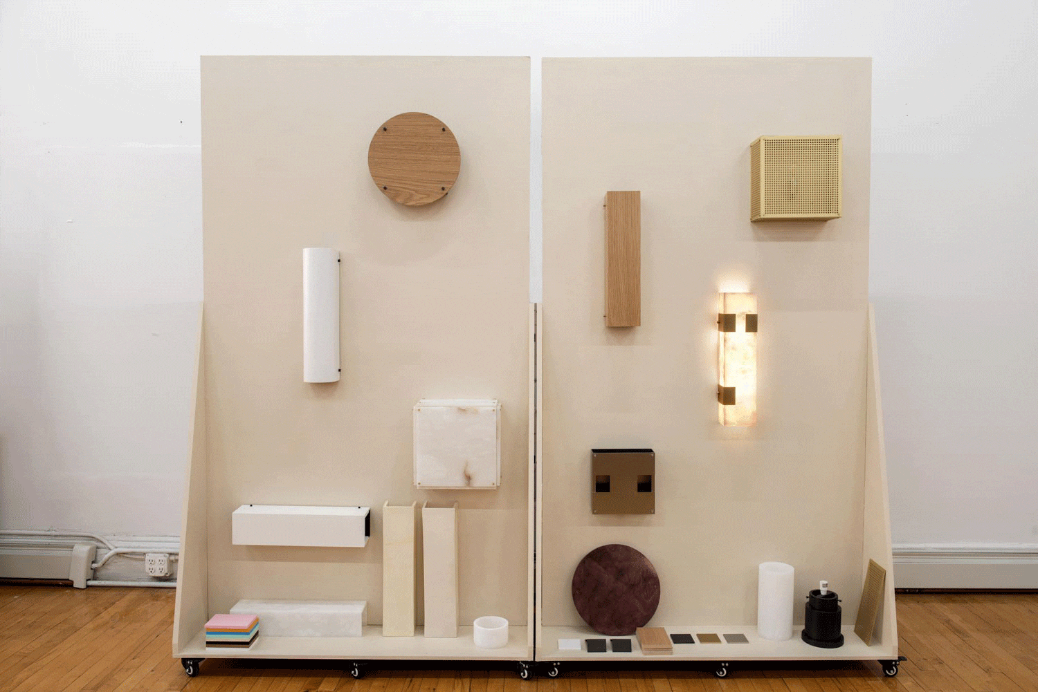 A demo wall of Orphan Work sconces.