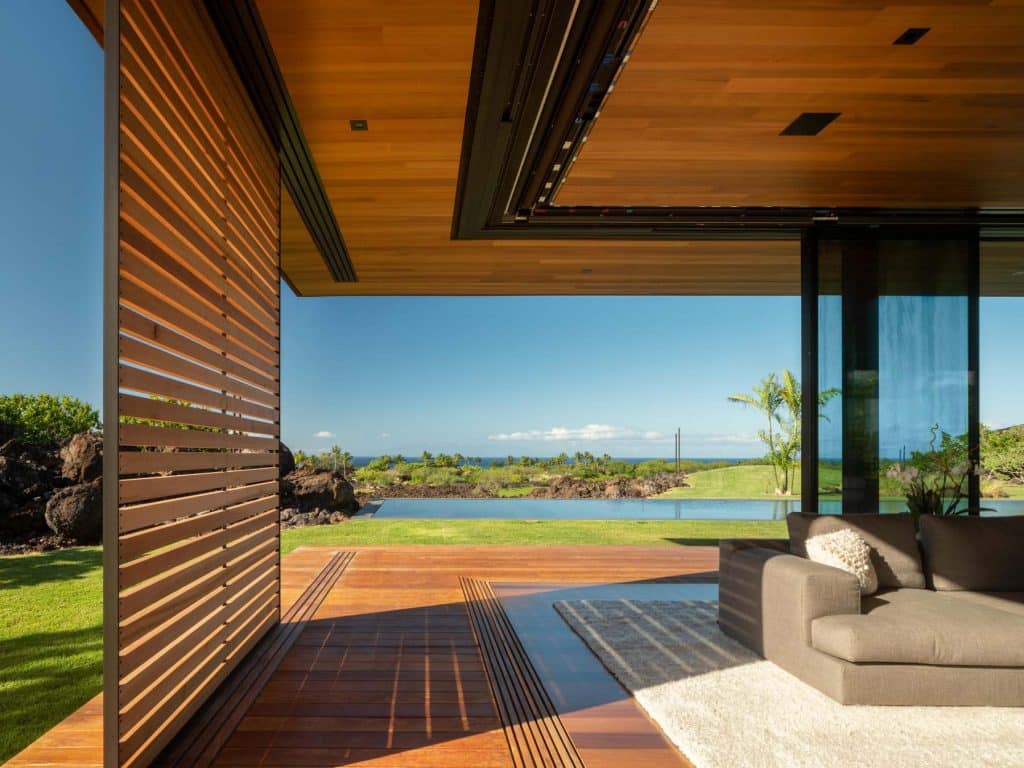 Architect Tom Kundig Olson Kundig Hawaii house Hale Lana living area sliding glass wall shutters