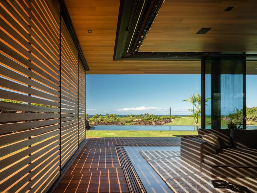 Architect Tom Kundig Olson Kundig Hawaii house Hale Lana living area sliding glass wall shutters