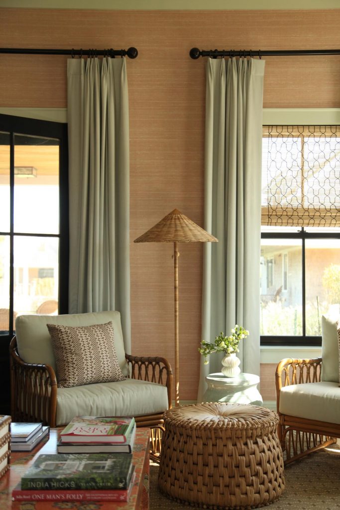 Rattan chairs in a Nantucket living room designed by Celerie Kemble