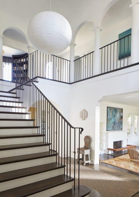 An oversize Noguchi pendant lamp in the entryway of a home in Los Feliz designed by Nickey Kehoe.