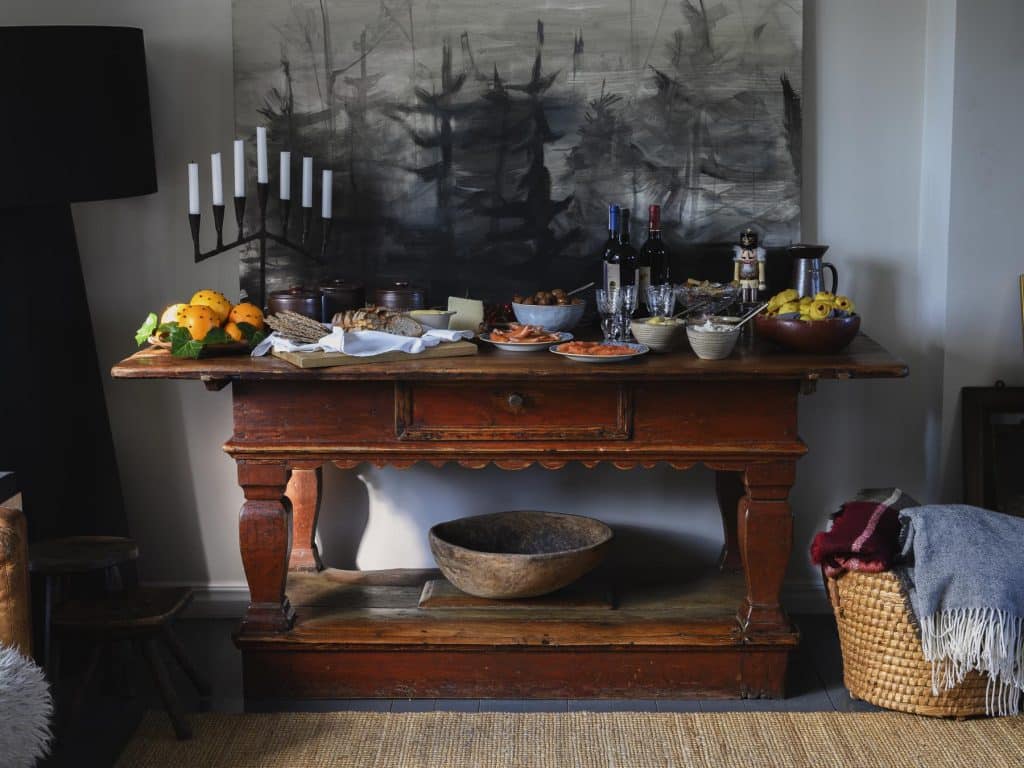 An early 18th-century Swedish baroque table from D.Larsson topped with a traditional Christmas meal known as Julbord.