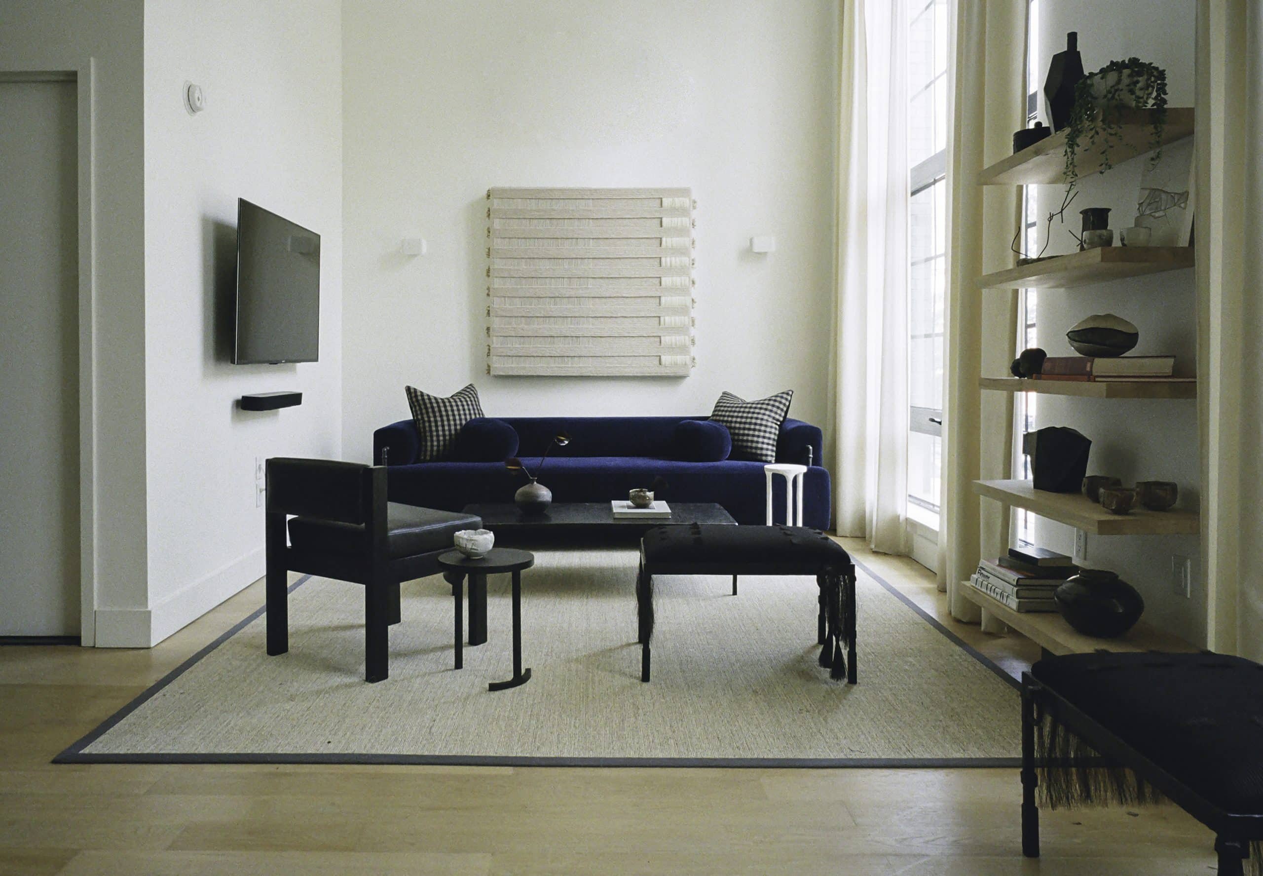 Szymanski designed the benches, tables and mohair sofa in the living room.