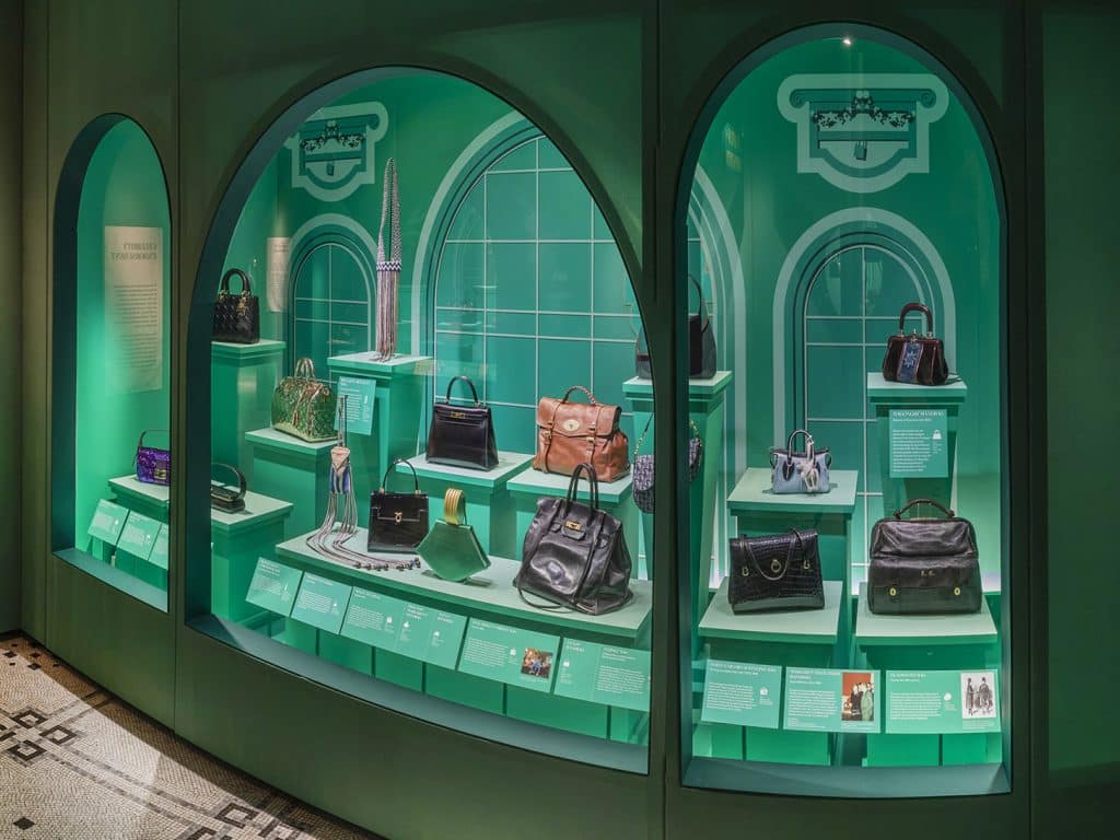 A vitrine in the "Status and Identity" section of the exhibition "Bags: Inside Out" at the V&A in London