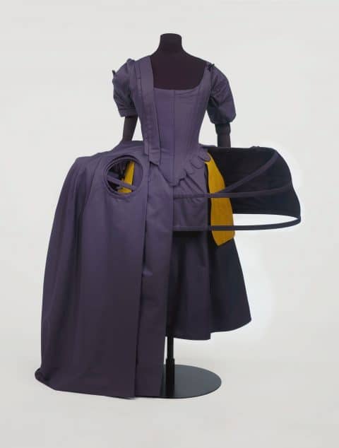 A cutaway dress showing a 1740s detachable pair of yellow silk pockets, from "Bags: Inside Out" at the V&A in London