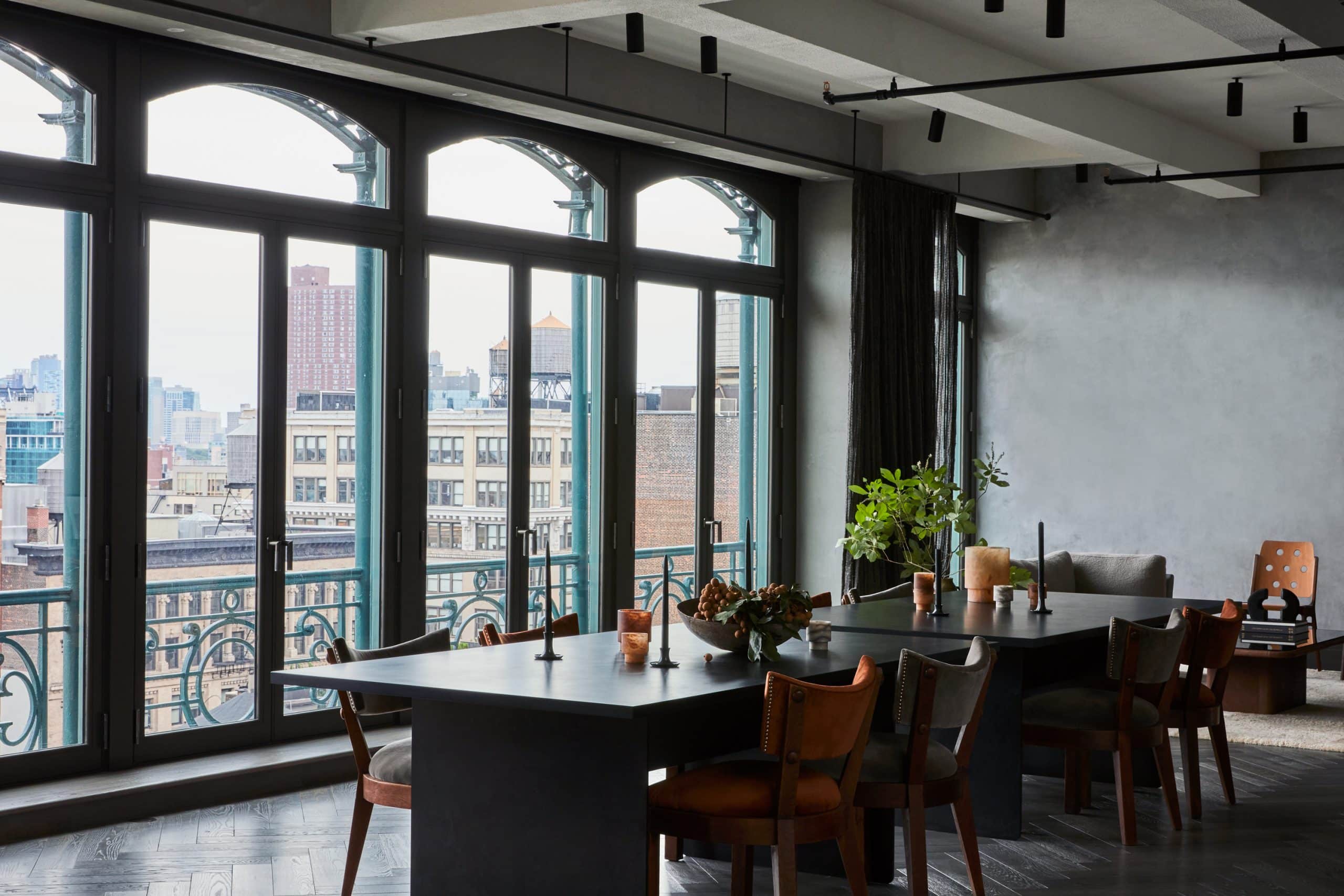 CHARLES DUDOUYT chairs surround the dining table in a New York apartment designed by Jesse Parris-Lamb