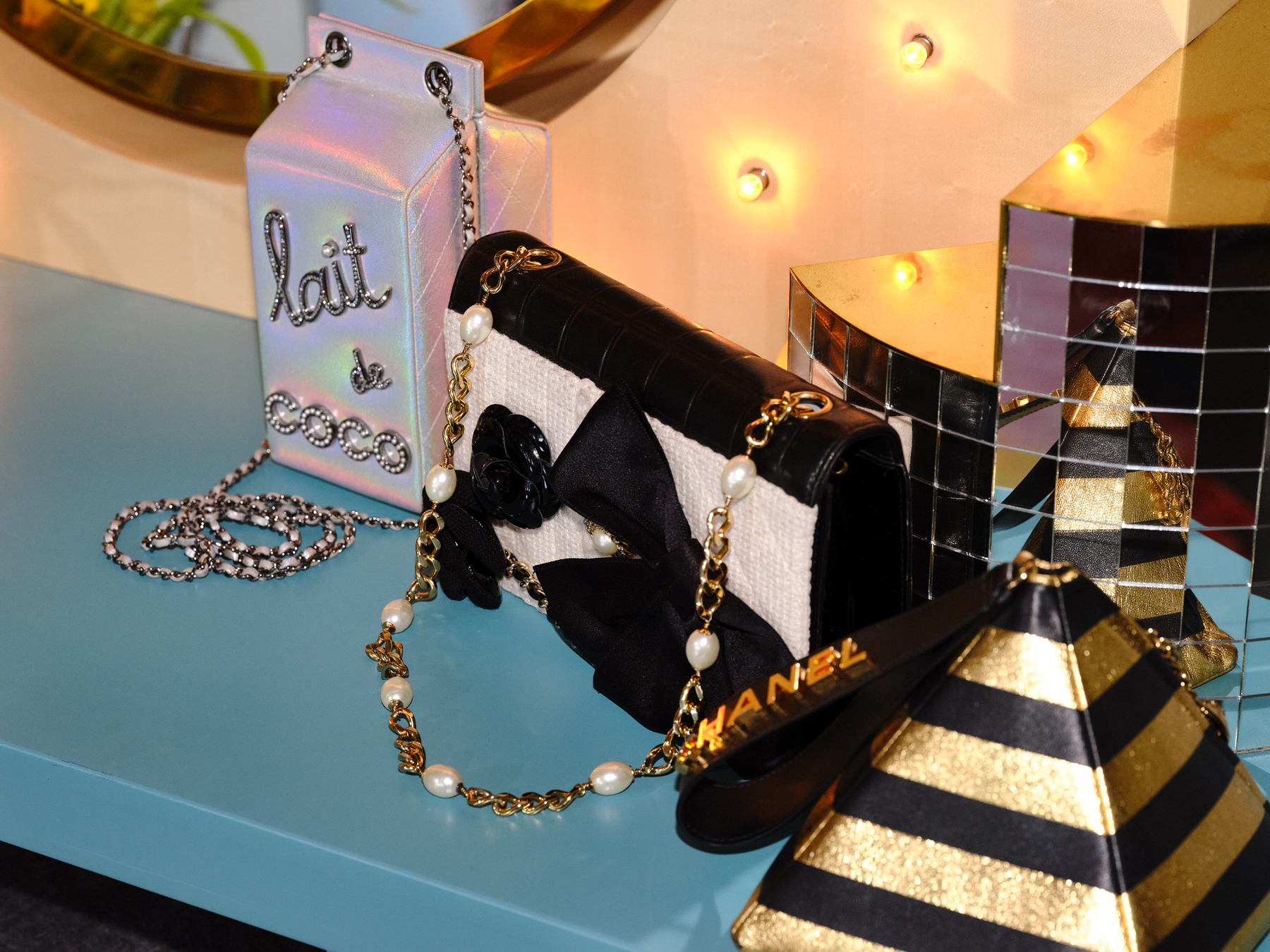 Chanel Lait De Coco MILK CARTON BAG, 2014–15; limited-edition Chanel Anniversary bag; and Chanel PYRAMID BAG, 2018