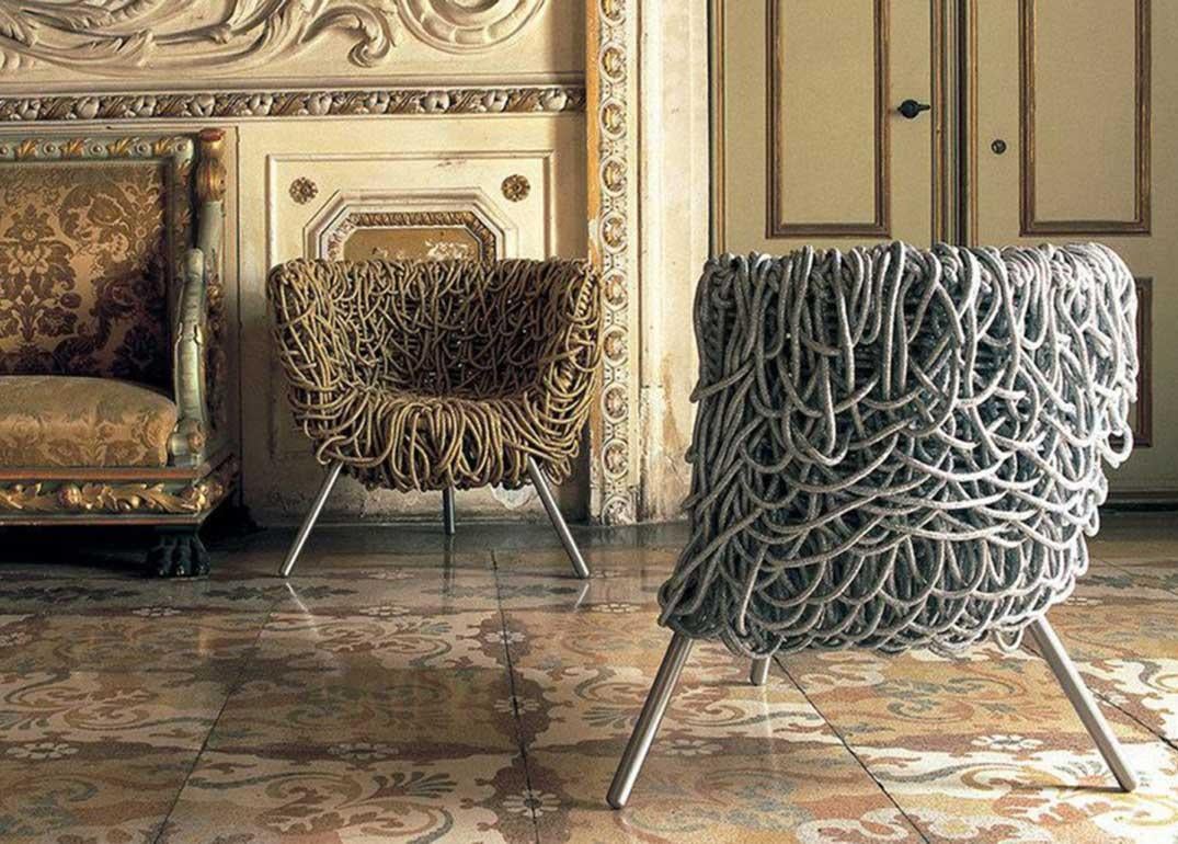Two Campana Brothers Vermelha chairs, one made of gold rope and one made of silver rope
