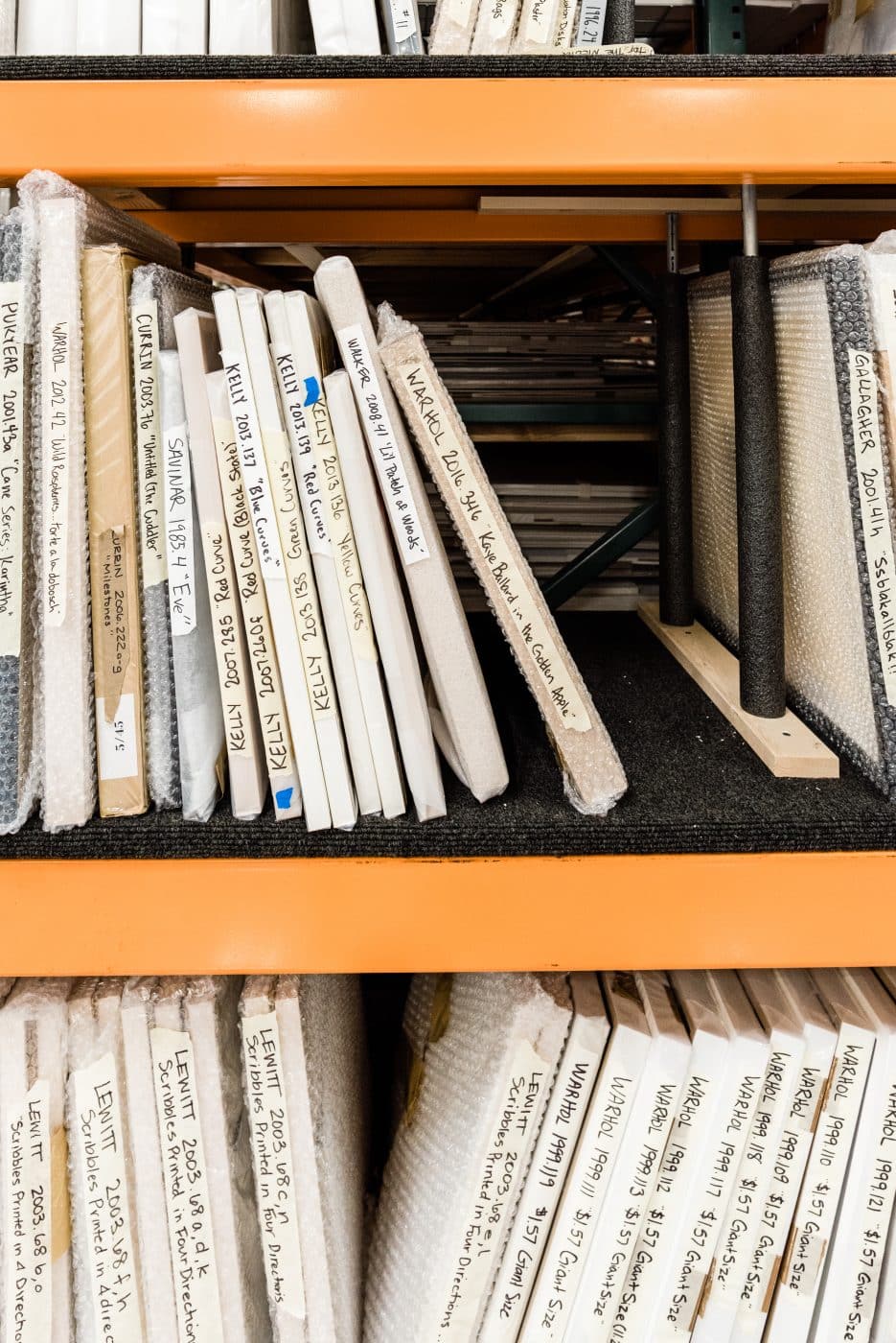 Warehouse shelves storing art from the collections of Schnitzer and the Jordan Schnitzer Family Foundation.