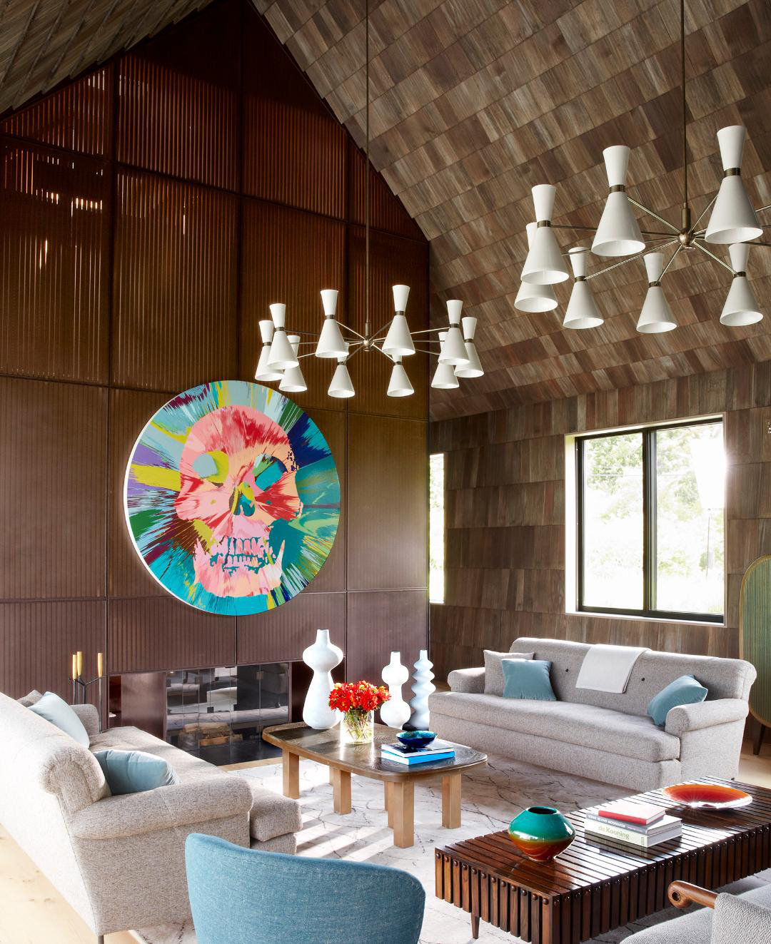 Interior of a Hamptons beach house, designed by Damon Liss and decorated with with tall black-and-white vessels by Lone Skove Madsen