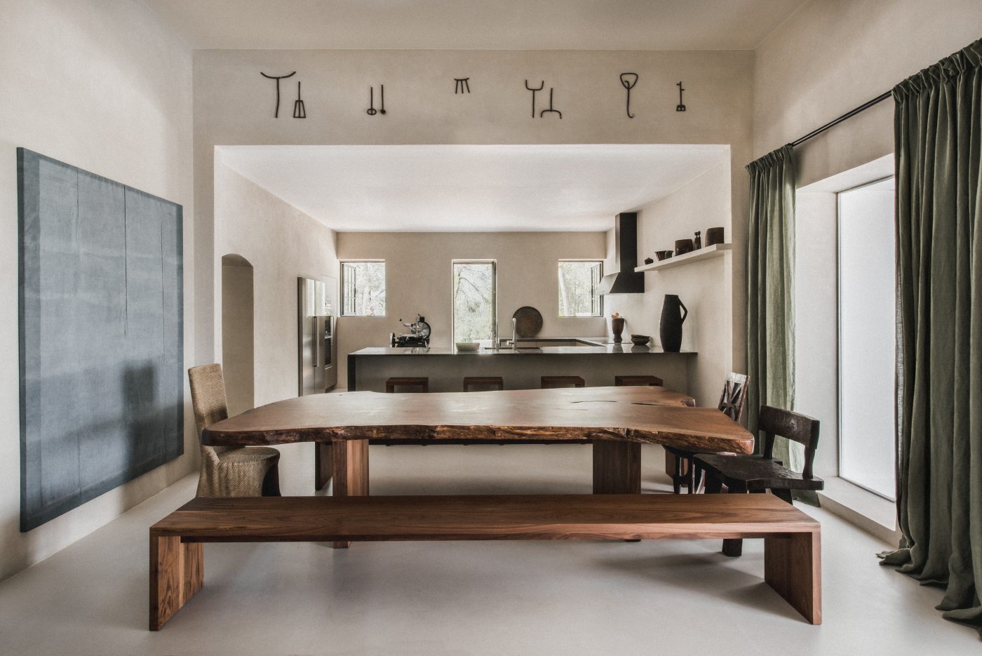 Dining room designed by Hollie Bowden featuring a walnut table