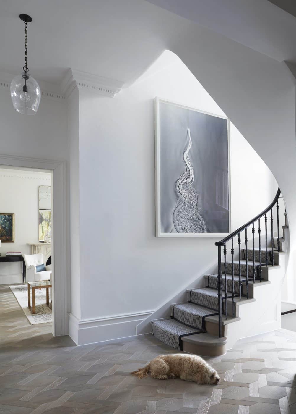 Holland Park stair hall featuring Adam Fuss artwork