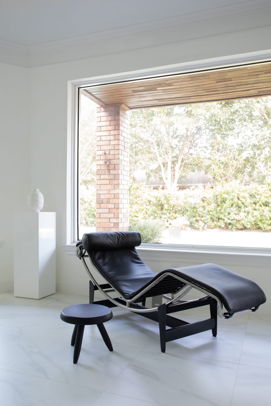 Recliner chair with side table in Mateo's Houston home