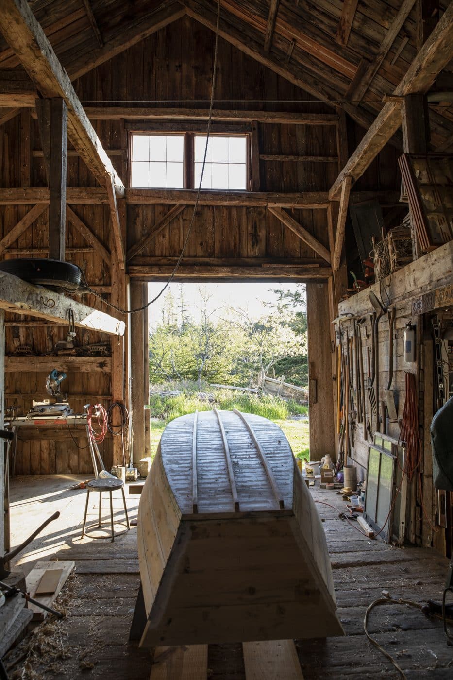 Image of a workshop where a wooden boat is being built