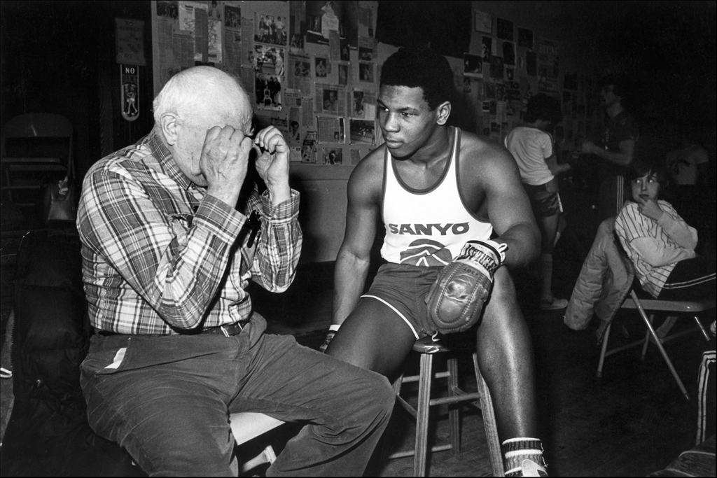 Mike Tyson, age 14, with Cus D’Amato. Catskill, New York, 1980, part of Lori Grinker's "Mike Tyson Portfolio."