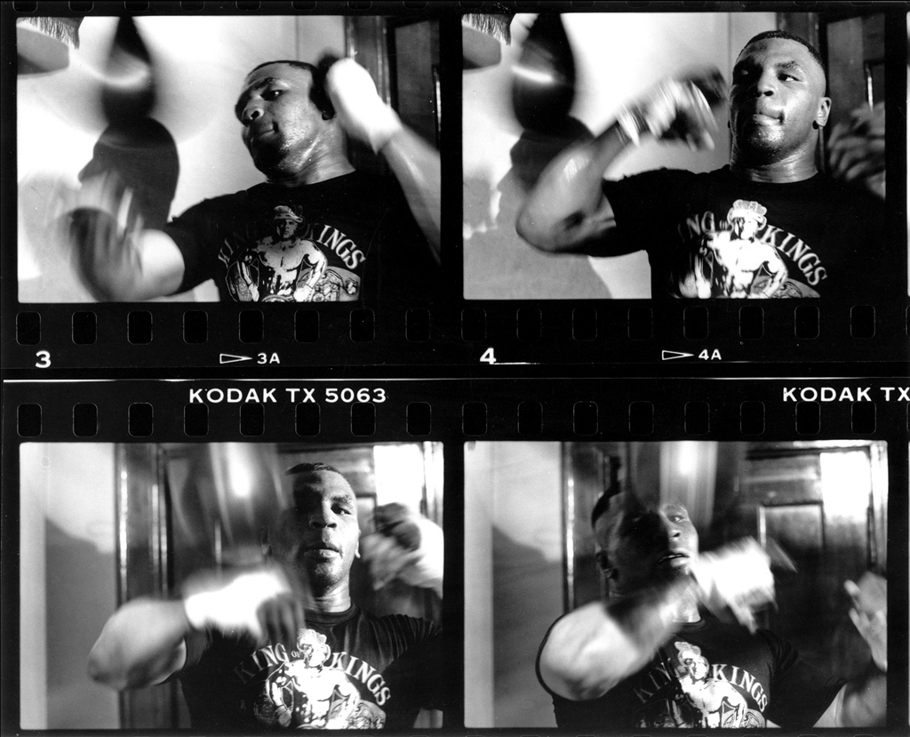 Lori Grinker's photo of Mike Tyson hitting a speed bag at Cus D’Amato’s gym. Catskill, New York, May 1988.