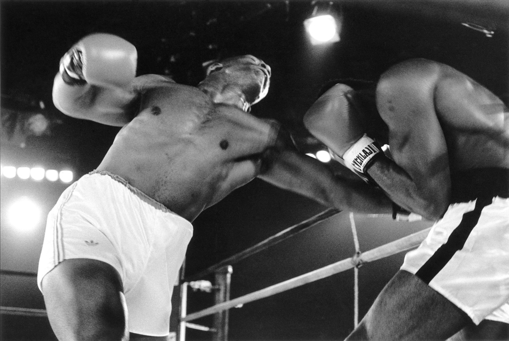 Mike Tyson, 19 years old, during one of his first pro fights. 1985. © Lori Grinker