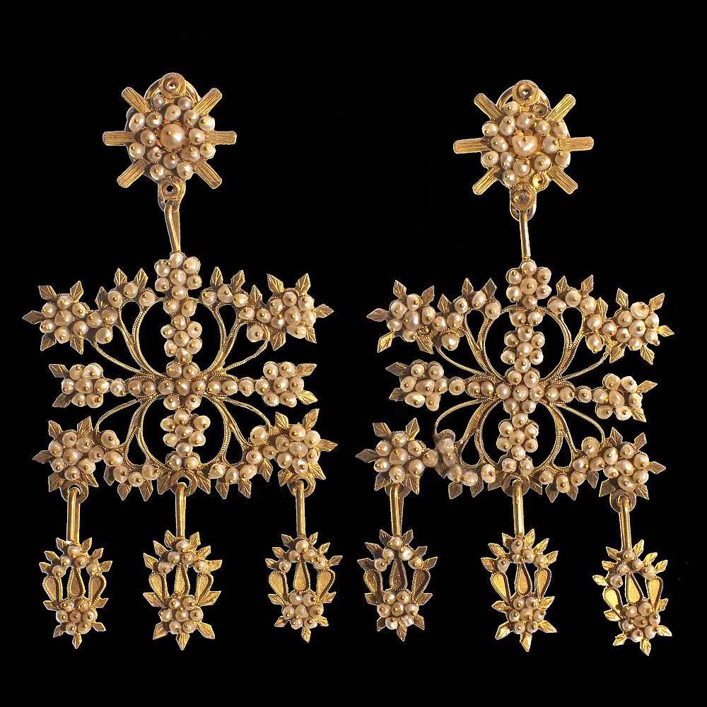 This pair of huge, almost four-inch-long Sardinian earrings is made from gold and seed pearls.