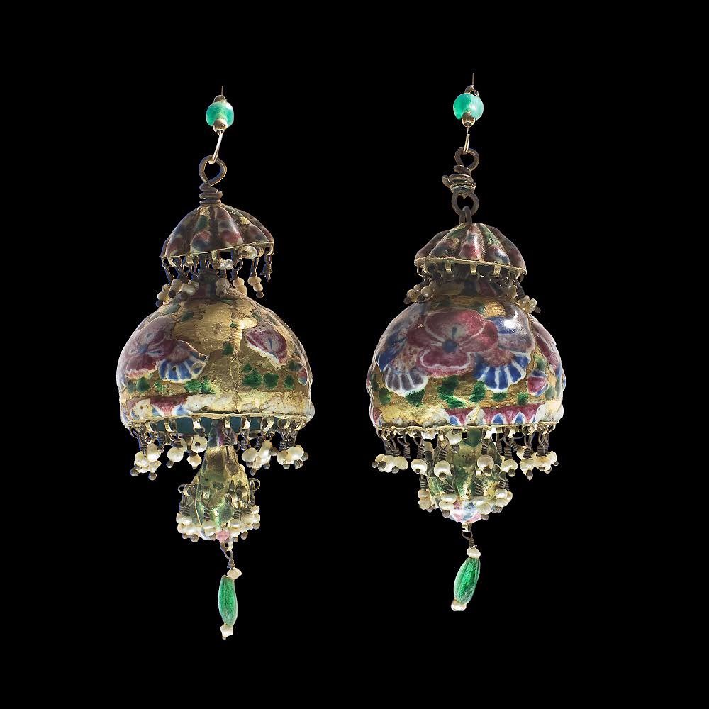 These ca. 1800 Persian earrings are made from gold and polychrome enamel.