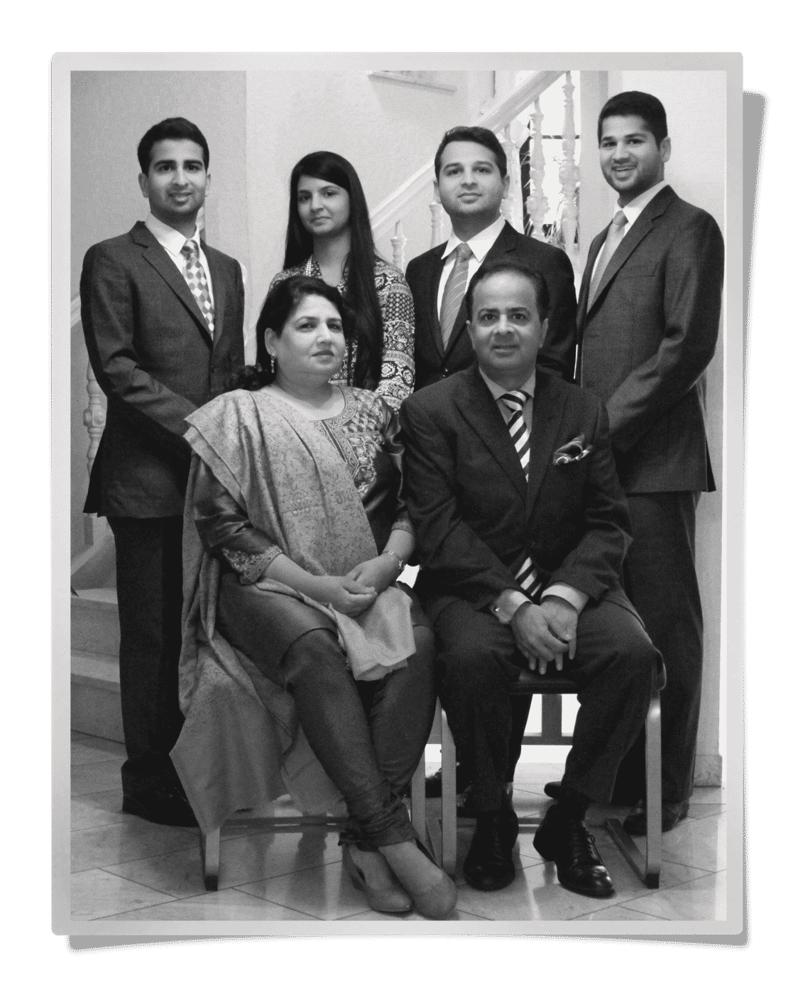 Family portrait of Vinit Rakyan, seated next to his wife, Sunita. Rakyan founded Global Gems. Standing behind them are their sons (from left) Archit, Anshul and Ashir, who are involved in the business.