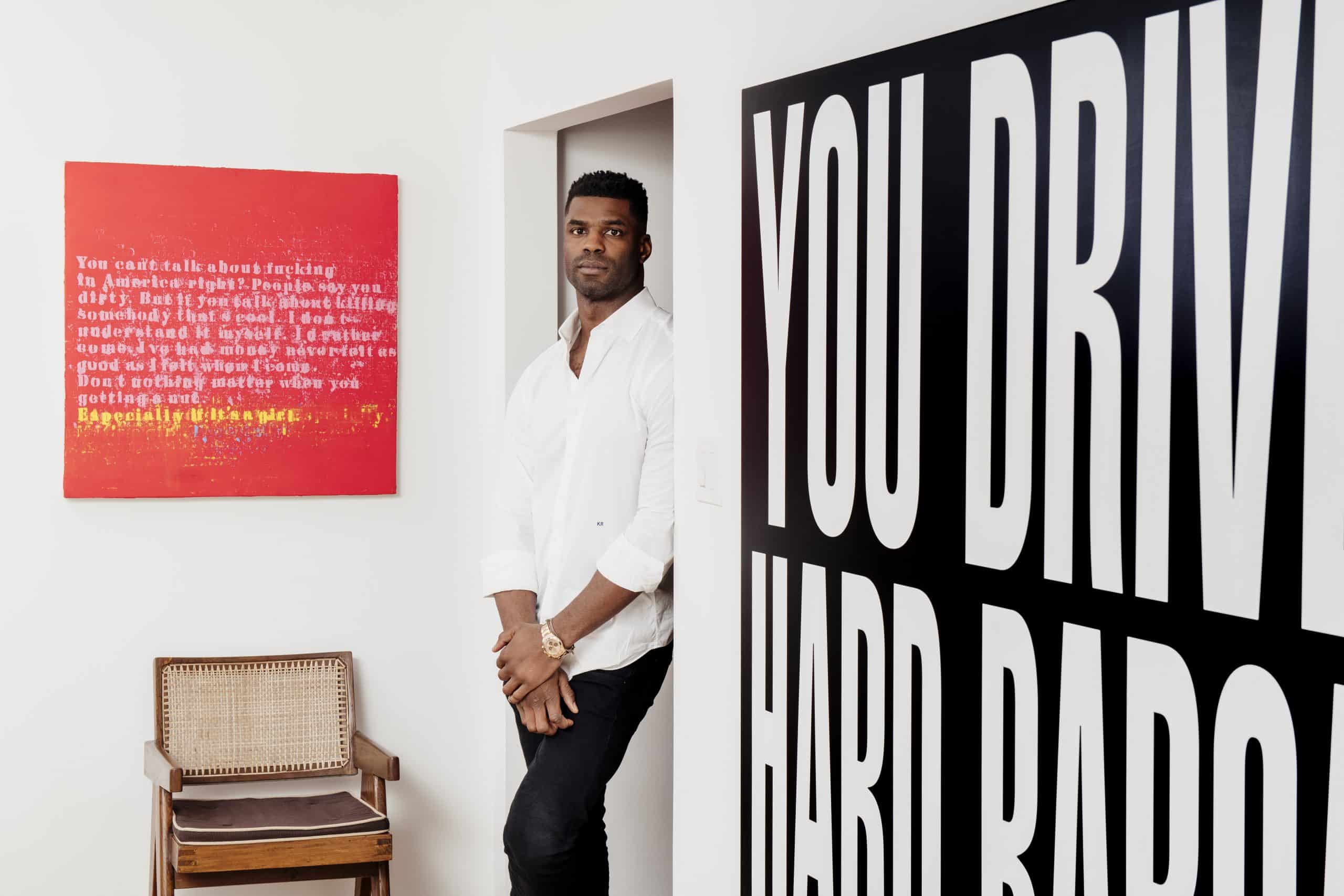 Keith Rivers art collection: Glenn Ligon’s Especially If It’s a Girl #1, 2004 (left), with BARBARA KRUGER's Untitled (You drive a hard bargain), 2011. The armchair is by PIERRE JEANNERET.
