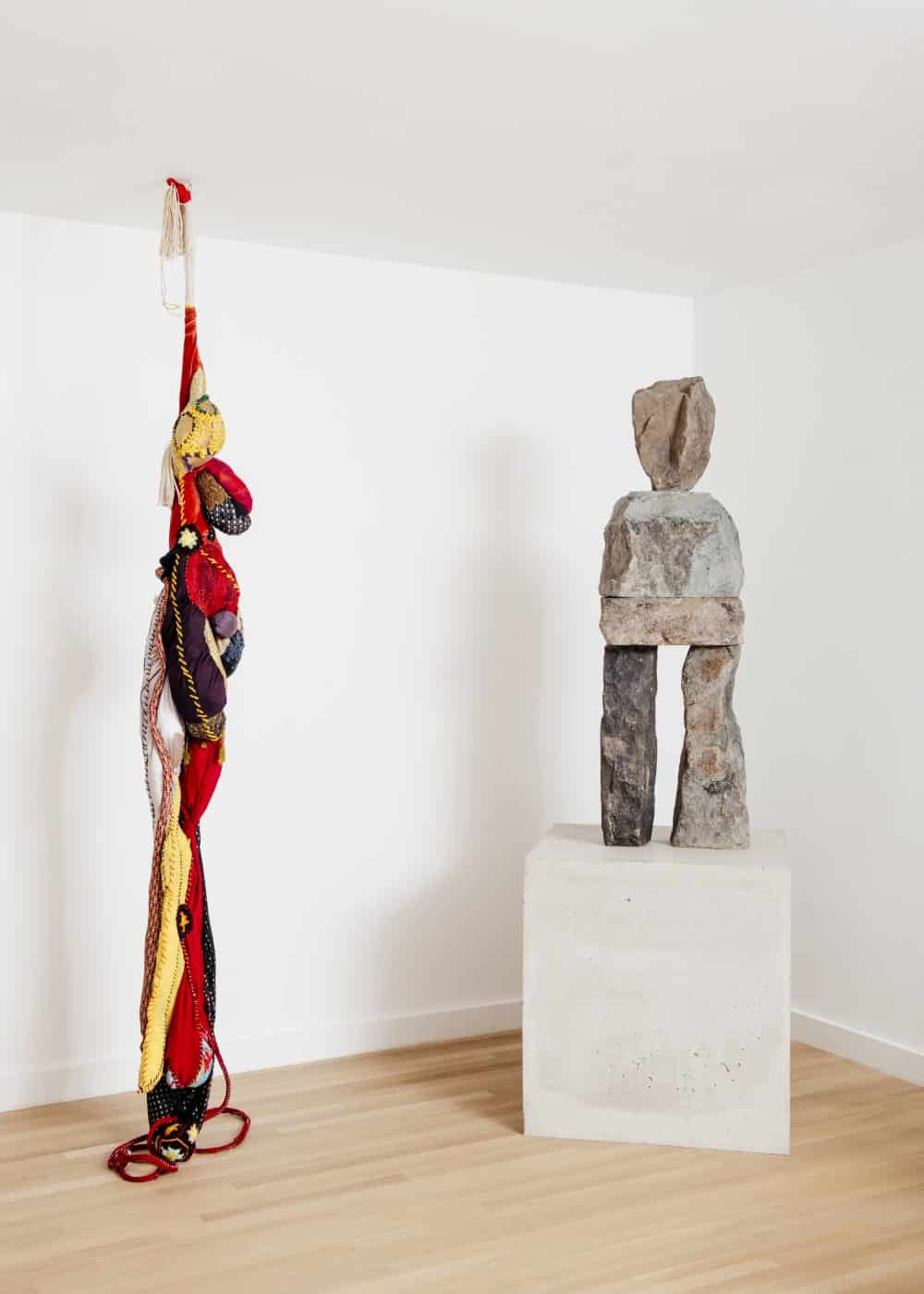 Keith Rivers art collection: Sen Título, de Série Pendentes, 2017, by Sonia Gomes (left) and The Cheeky, 2016, by UGO RONDINONE are among the contemporary creations displayed in the Beverly Hills home of collector Keith Rivers. 