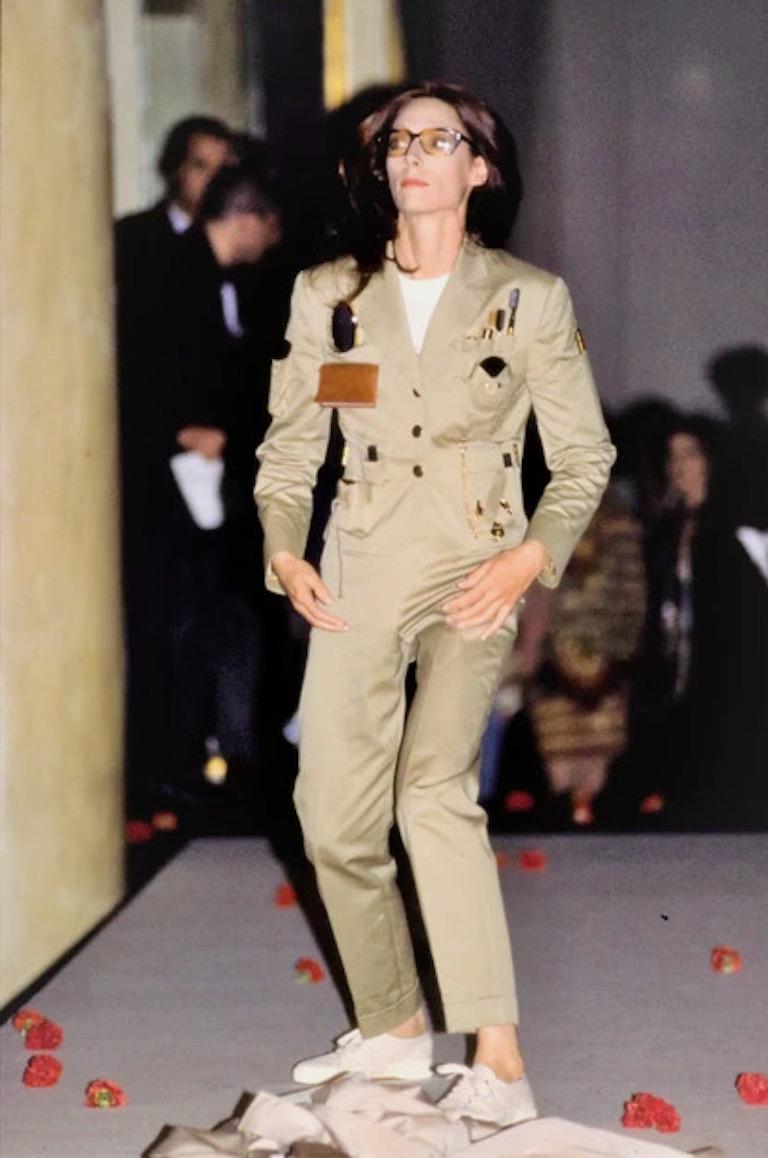 A model wears the Survival Jacket pantsuit at Moschino's Spring/Summer 1991 runway show. 