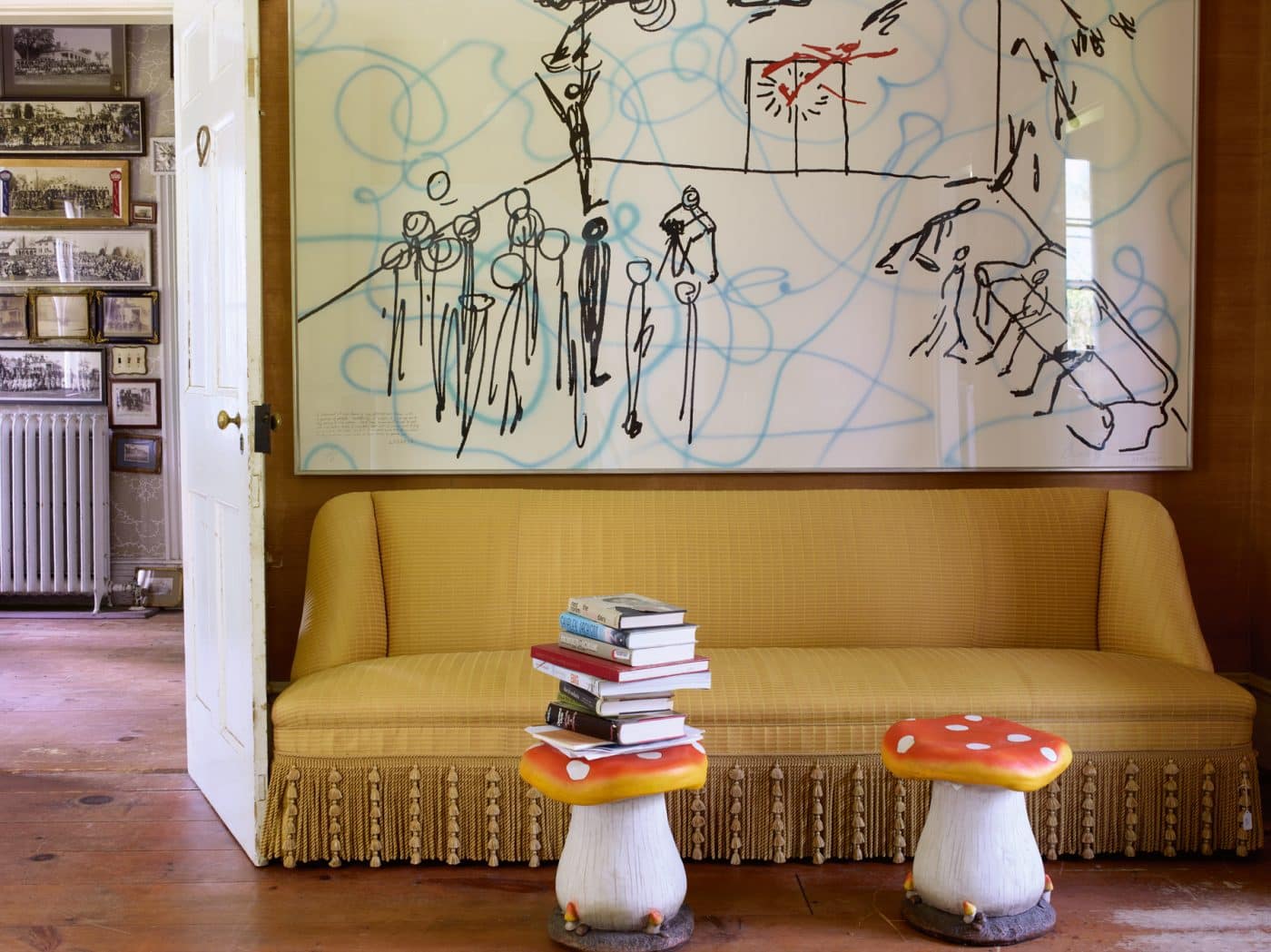 Sofa with toadstool tables and Jonathan Borofsky artwork