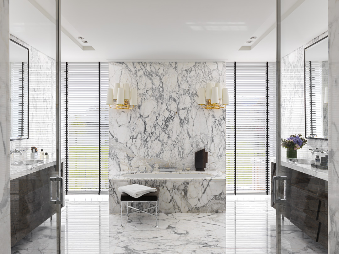 Image of the main bathroom, which features marble flooring