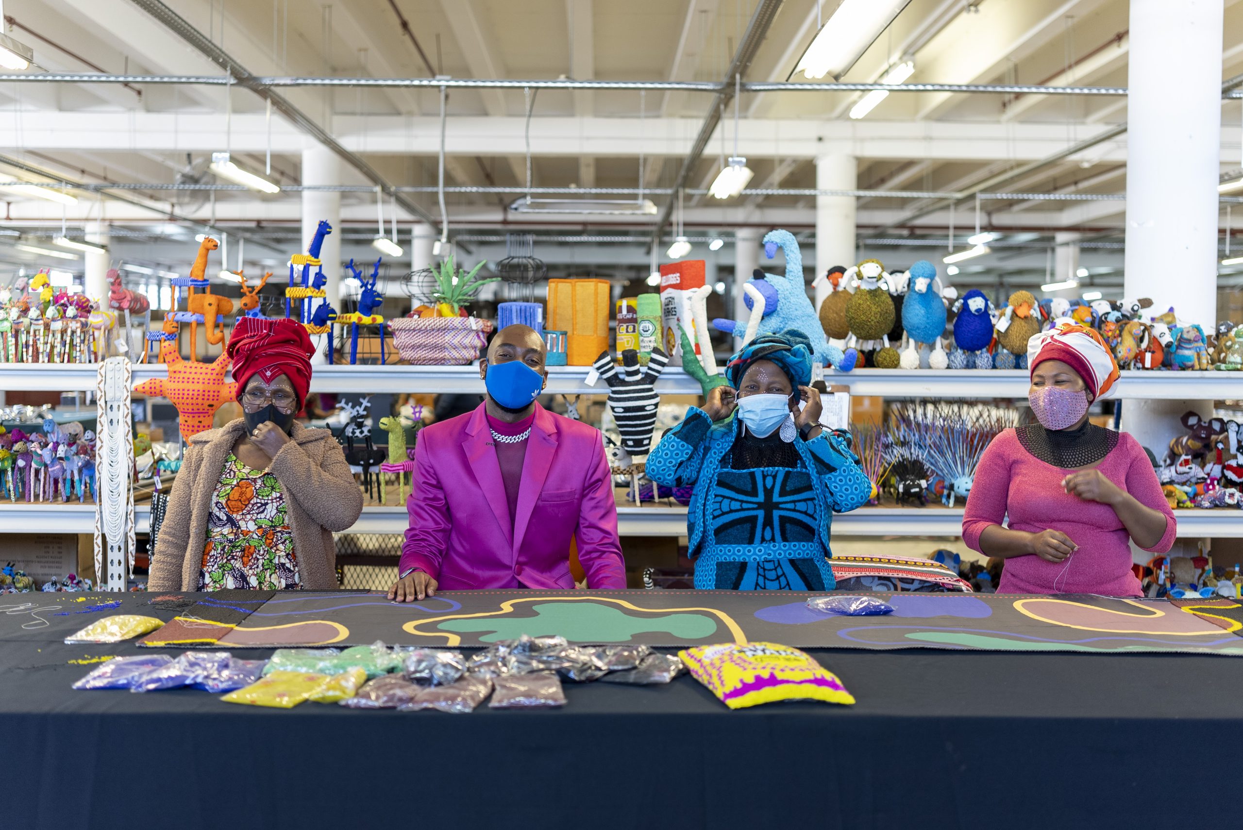 Rich Mnisi with craftswomen from the Cape Town nonprofit MoneyBiz