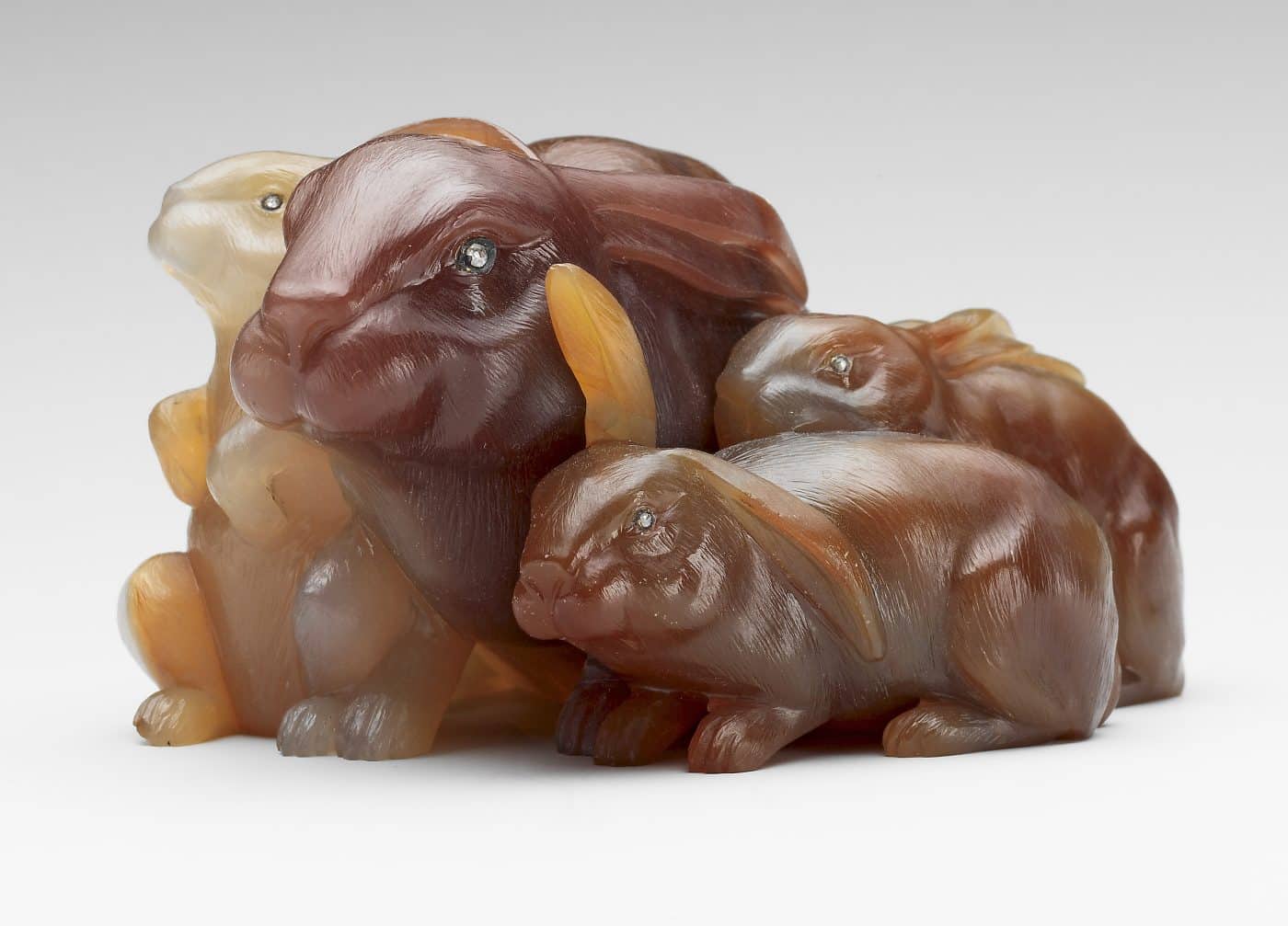 Fabergé carved bunnies with gem eyes

