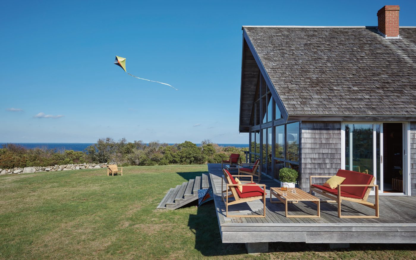 Block Island house in New England, featuring Design Within Reach furniture after a Risom design