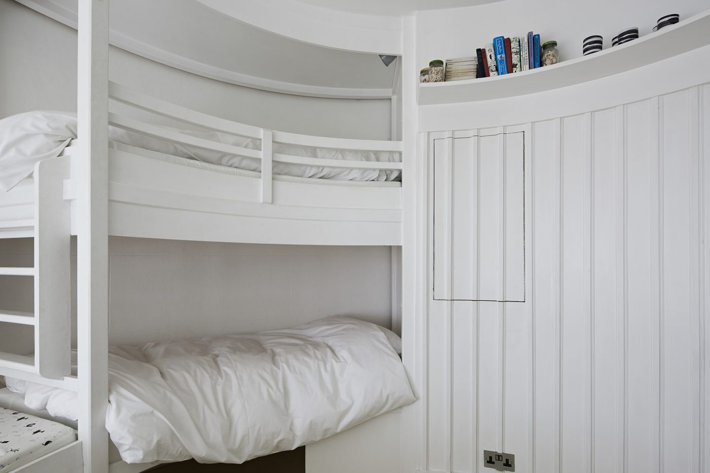 white bunk room in Sally Mackereth's lighthouse home