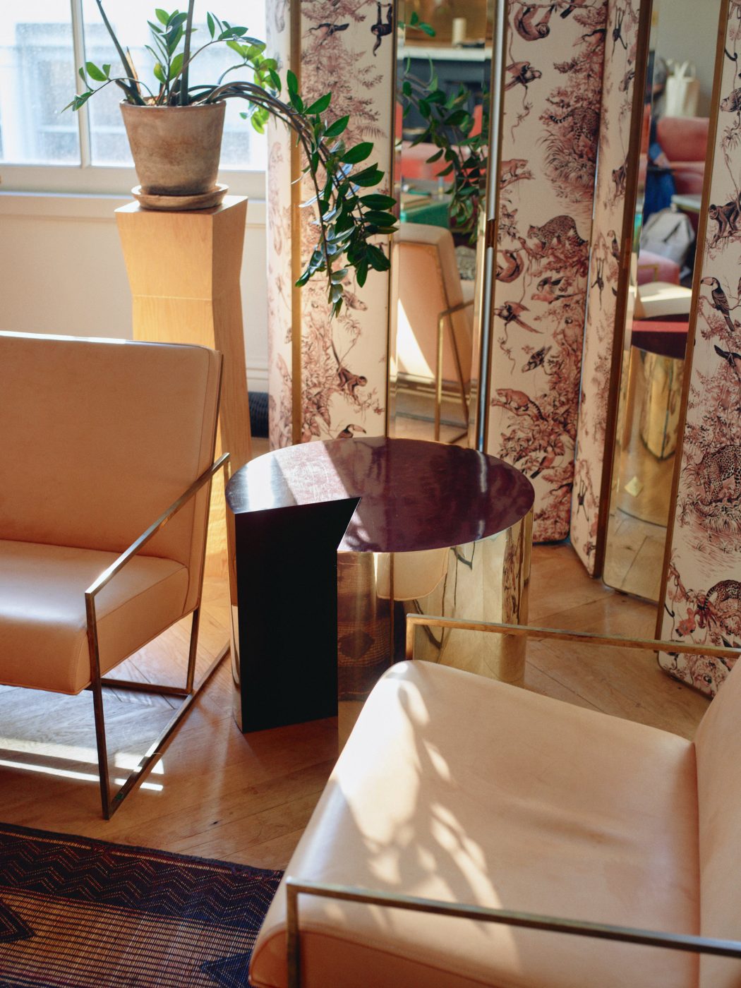 Brass side table positioned in the living room