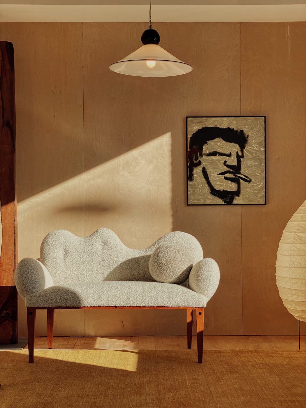 a Joaquin Gasgonia Palensia sofa is paired with painter Robert Loughlin's Pot Head