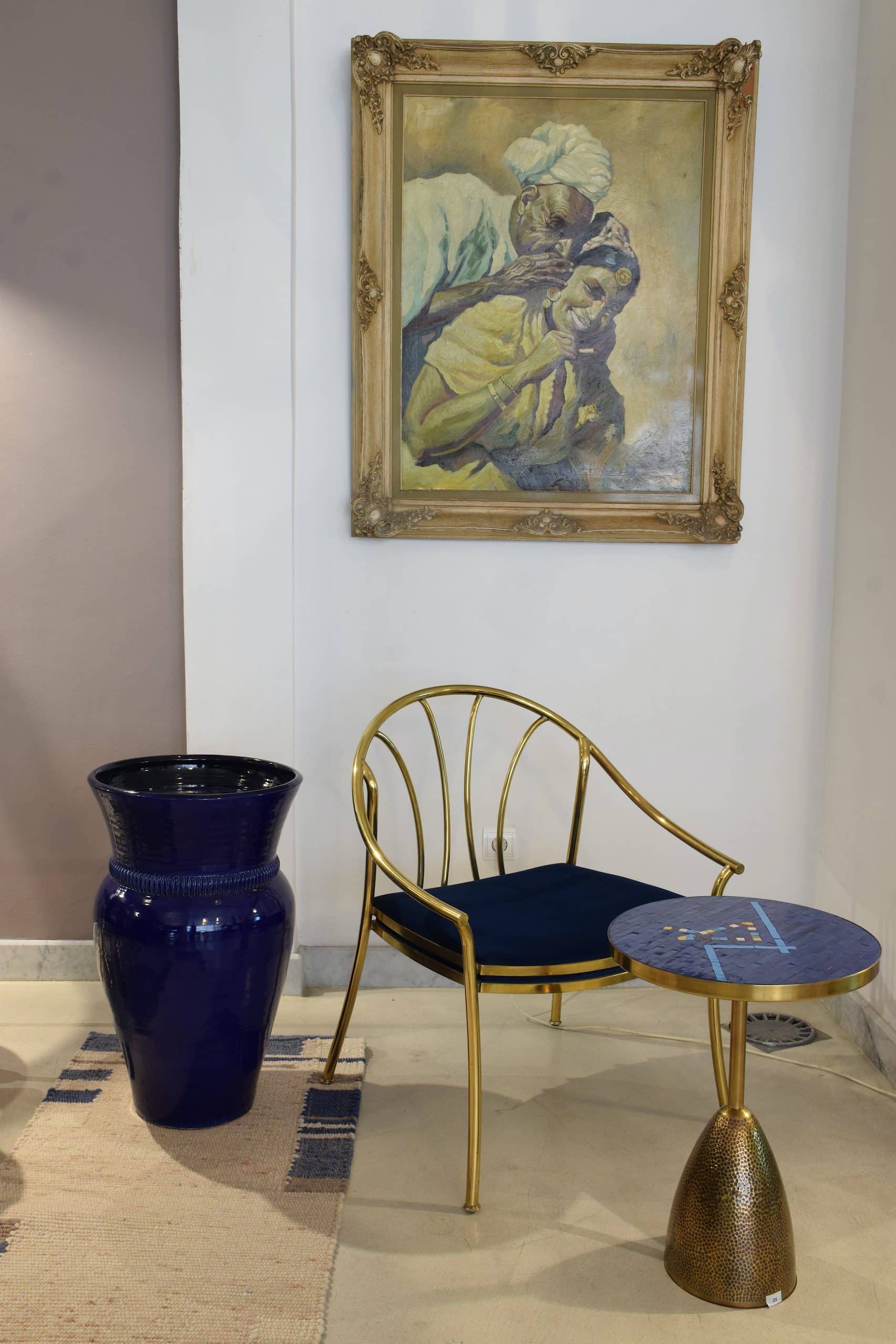 A JAS blue ceramic jar, a late-20th-century Italian brass armchair and a JAS brass side table with a mosaic top