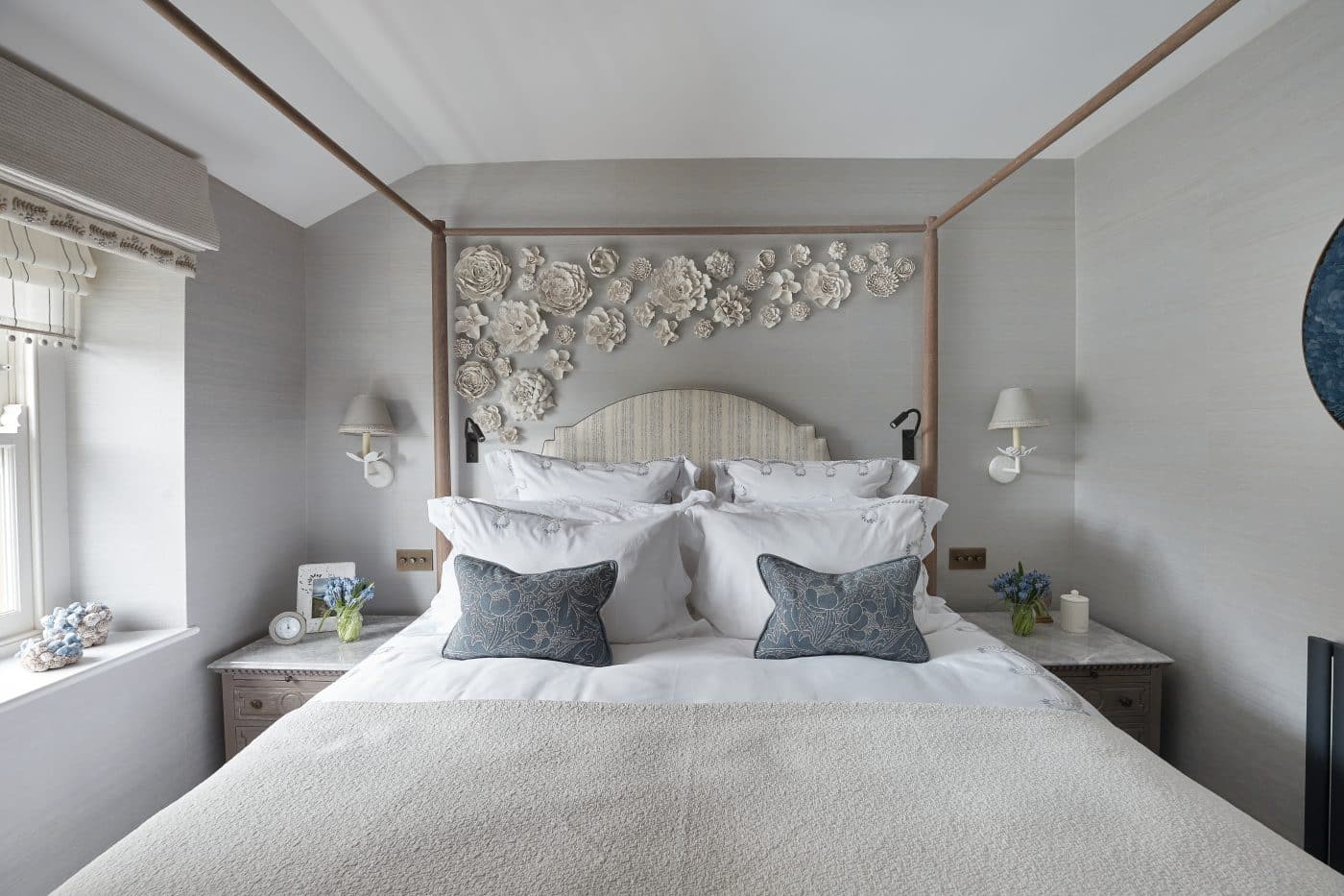 gray and white bedroom with four-poster bed by Katharine Pooley