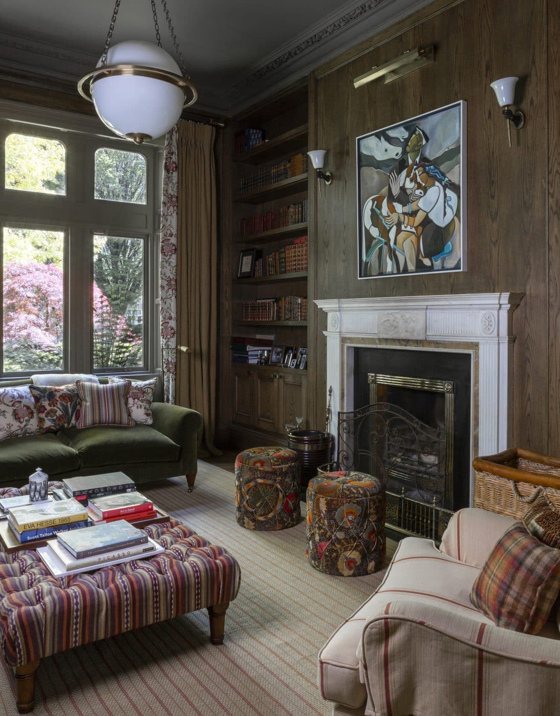 Library of Victorian house in Dublin designed by Bryan O'Sullivan with patterned upholstery
