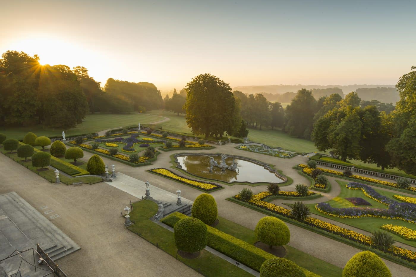 Formal Victorian-style parterre gardens at Waddesdon Manor in England with three-dimensional planting
