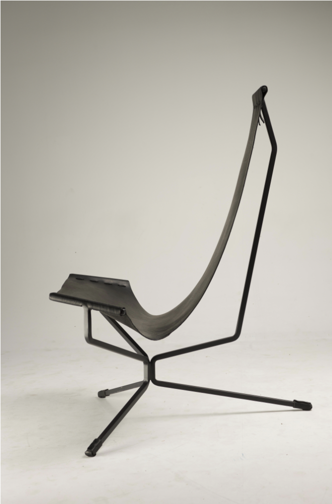 A Daniel Wenger chair with a black leather sling-shaped seat on a black steel frame